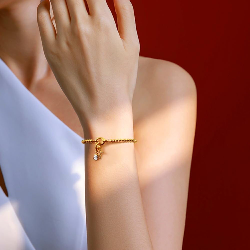 Free bird Cross Birthstone Bracelet | Dainty 14K Gold Plated Cross Charm Bracelet for Women | Stretchable Elastic Gold Beaded Bracelet | Stackable Trendy Birthstone Bracelet | Jewelry Gifts for Women - Image 2