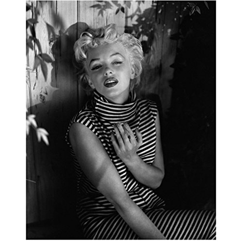 Marilyn Monroe Posing by Fence Smoking a Cigarette 8 x 10 Inch Photo at  Amazon's Entertainment Collectibles Store