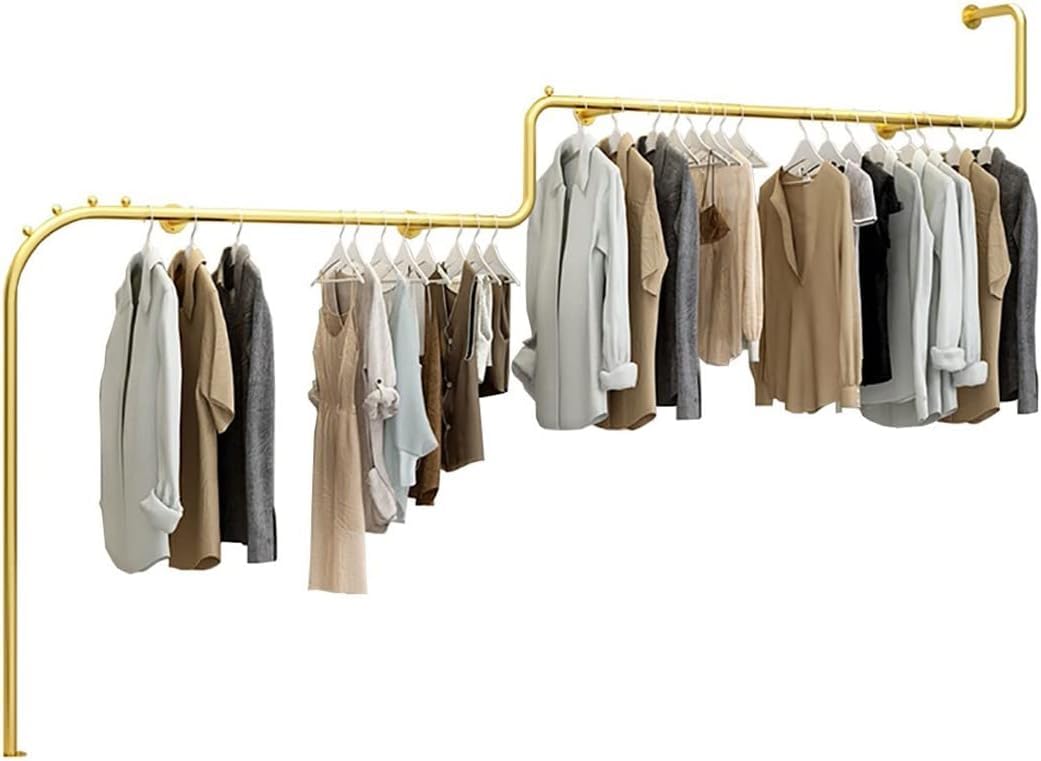 Magasins de vêtements optimisés grâce à la tringle à vêtements créative murale