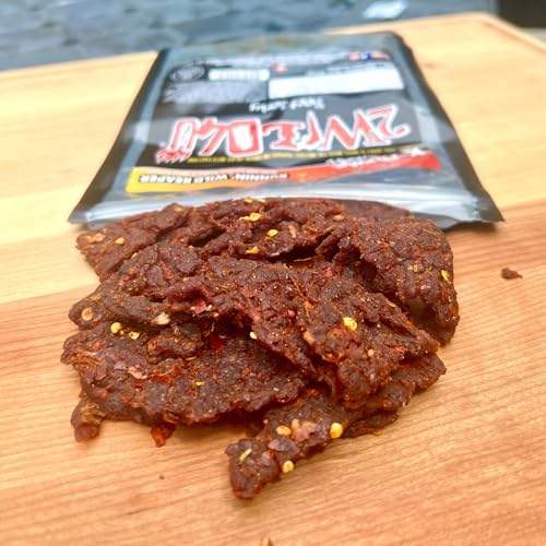 Image of Carolina Reaper Beef Jerky - Premium Brisket Cuts | Extreme Heat | 27g of Protein Per Bag | Small Batch, Real Carolina Reaper & Ghost Pepper Infused | 2WILD4U: Eat If You Dare - 6 ounces total (Pack of 2 bags, 3 ounces each)