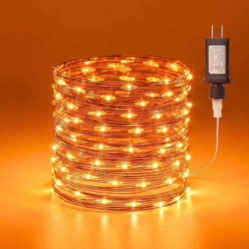 Image of Halloween Lights Plug in, 33FT 100LEDs Orange Fairy Lights, Waterproof Flexible Black Wire String Lights for Bedroom Home Party Ghost Haunted House Indoor Outdoor Halloween Decorations, Orange