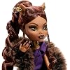 دمية Monster High Doll، Clawdeen Wolf House of Wolf Collectible مع معطف جاكار من الفرو الصناعي، فستان بليزر أرجواني، أحذية بنطال وإكسسوارات ذهبية