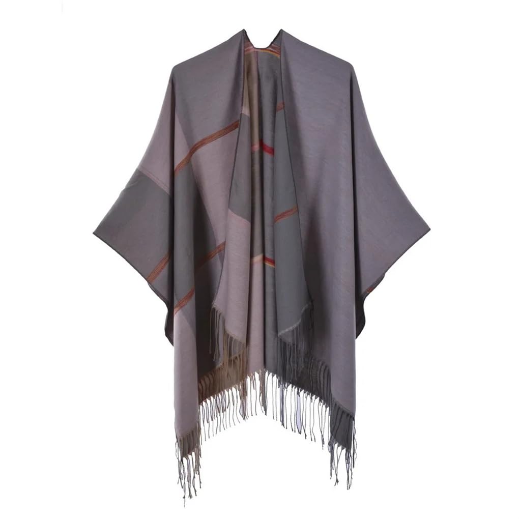 Poncho en tricot à pompons pour l'automne et l'hiver