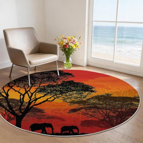 Tapis rond 90 cm silhouette d'arbres rouges lavable