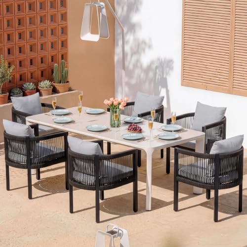 Black rope-detailed patio dining chair with cushioned seat and armrests — proves the galvanized steel frame for uneven balcony floors