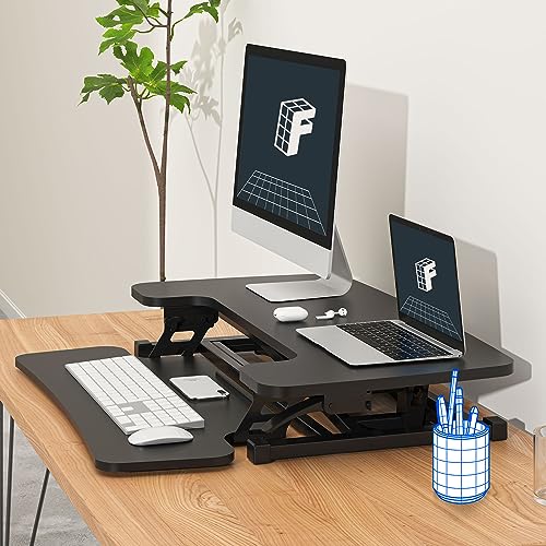 Image of FLEXISPOT Height Adjustable 32in Standing Desk Converter Sit to Stand up Desk Riser Computer Workstation with Wide Keyboard Tray 2-Tier Desktop Black