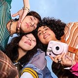 aparat natychmiastowy instax mini 13 z wbudowaną automatyczną lampą błyskową, wbudowanym lusterkiem do selfie, trybem zbliżenia i samowyzwalaczem, kolor Candy Pink