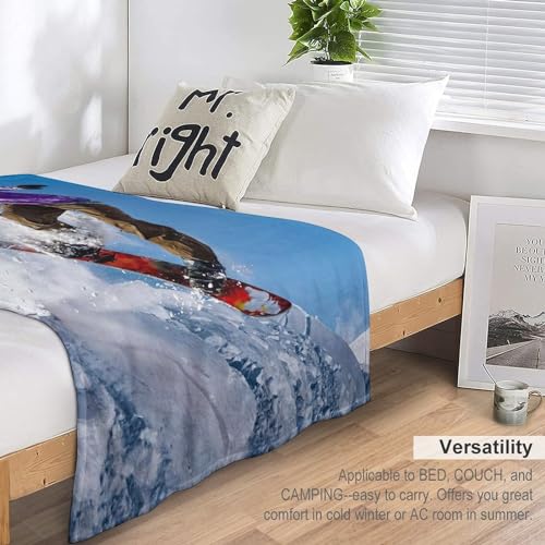 Couverture snowboard en polaire pour soirée cocooning sur canapé