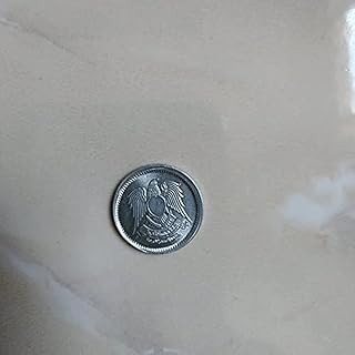 اصغر عملة معدنية قديمة في العالم من الالومنيوم من عام 1972