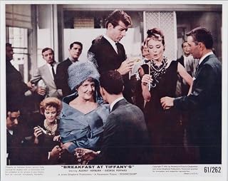 Breakfast at Tiffany's Audrey Hepburn enjoys wild party at apartment 8x10 photo