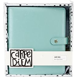 A light blue blue notebook that says carpe diem