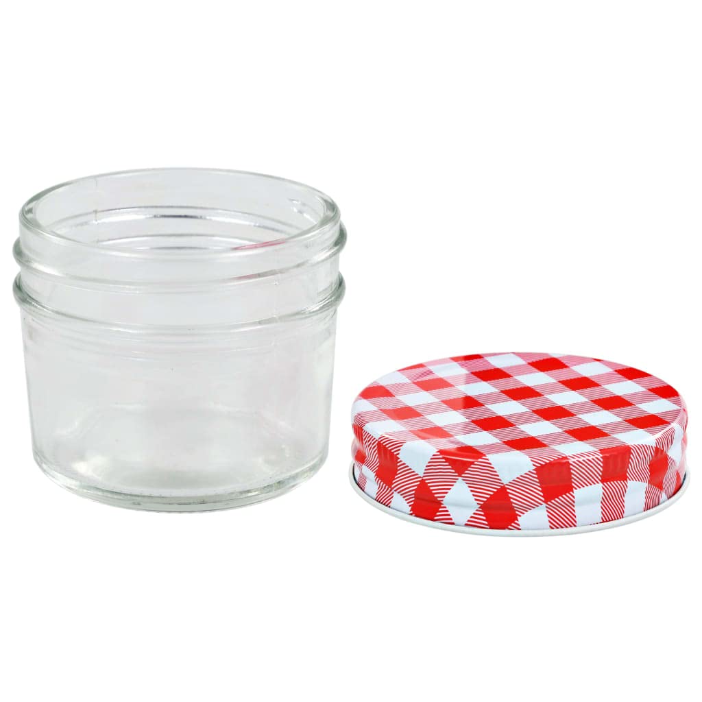 96 transparente Einmachgläser 110 ml mit rot-weißen Deckeln, ideal für Marmelade, Chutney, Essiggurken und Saucen, mit weitem Mund für einfaches Befüllen und Entnehmen.