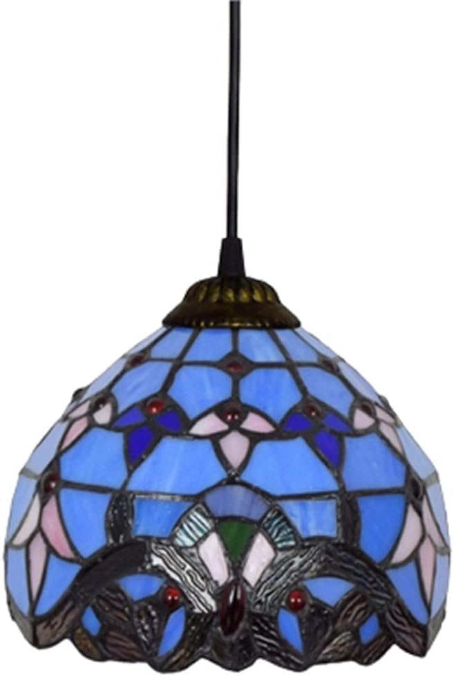 Plafonnier en verre teinté bleu pour illuminer un salon chaleureux