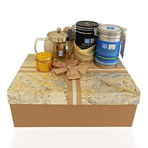 Luxe gift set van zeldzame selectie van groene thee blad met slanke en moderne transparante glazen Theepot