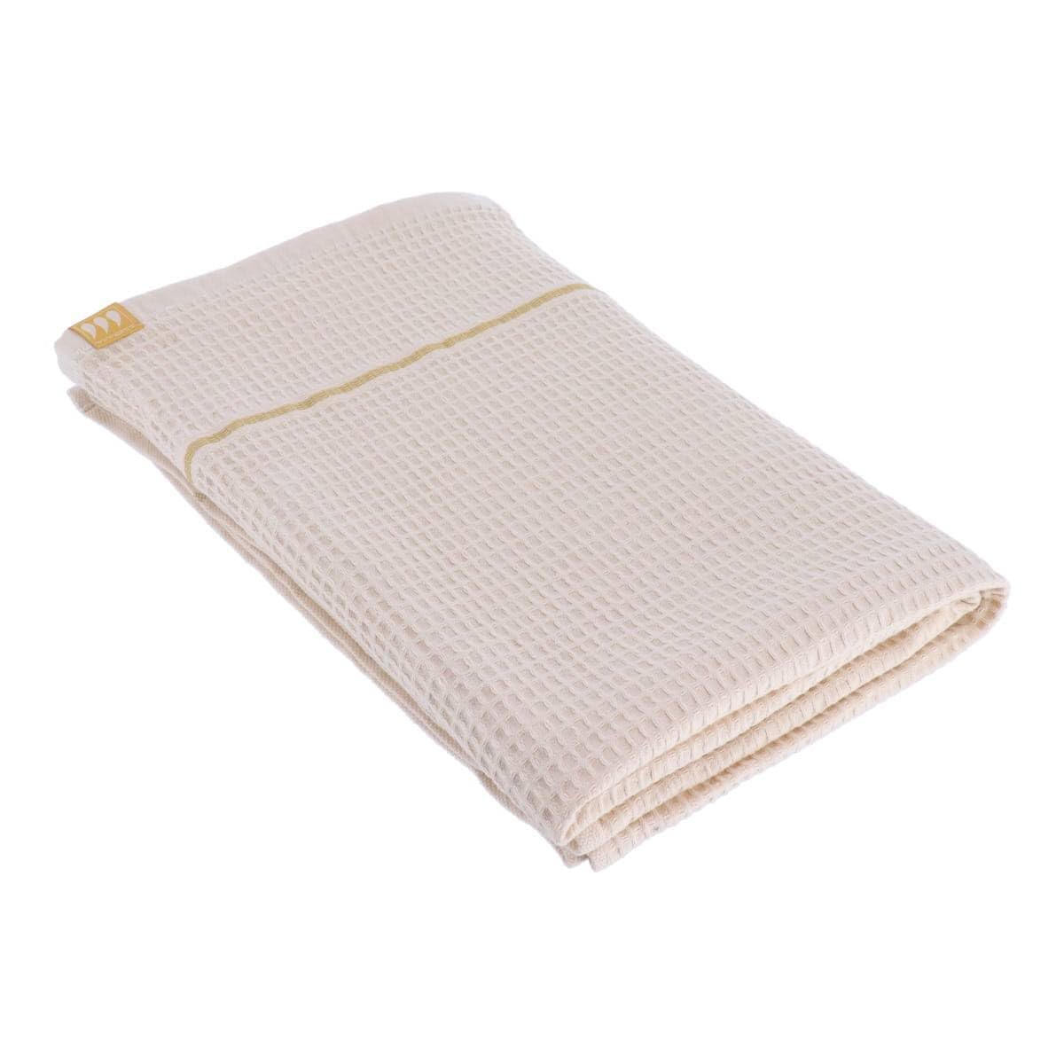 Serviette de bain en coton nid d'abeille beige pour créer une ambiance spa à la maison