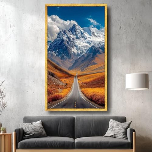 Agrandir une pièce sombre avec un grand tableau paysage de montagne lumineux