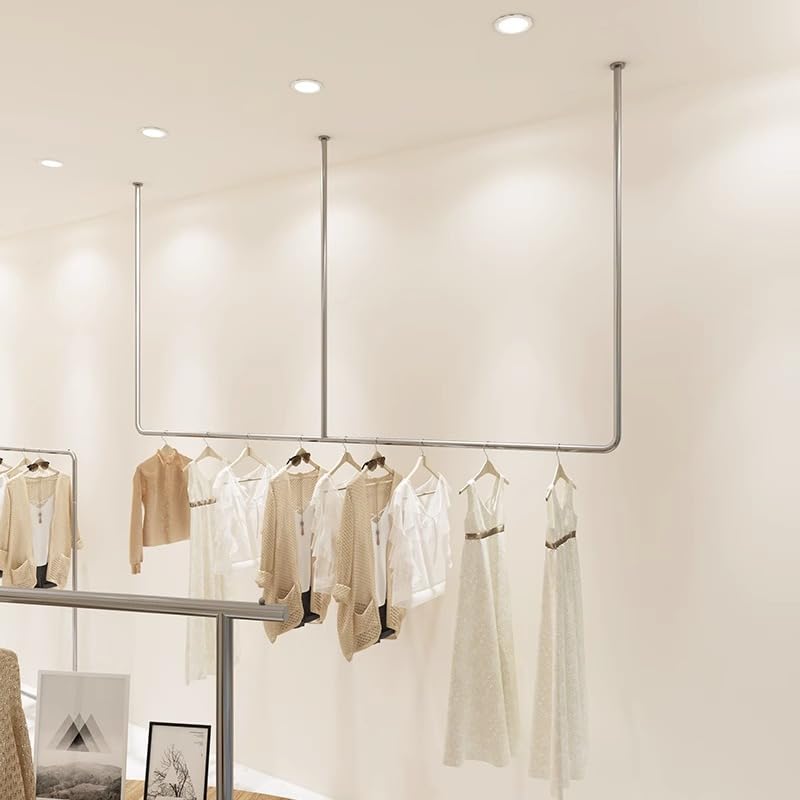 Cintres muraux et porte-manteaux de plafond pour un dressing suspendu et aéré