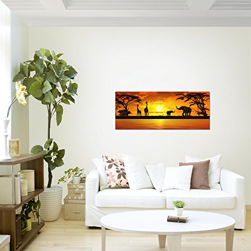 Runa Art Wandbild Afrika Sonnenuntergang 1 Teilig 100 x 40 cm Modern Bild auf Vlies Leinwand Giraffe Elefant Wohnzimmer Schlafzimmer Orange 000212a
