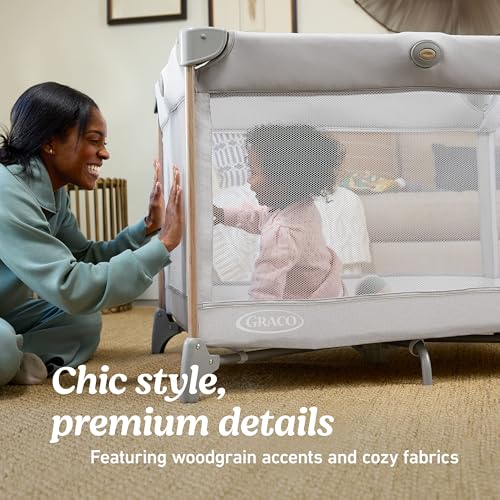 Image of Graco Pack n' Play CareSuite Playard, Portable Playpen with Baby Bassinet, Changing Table, Sky