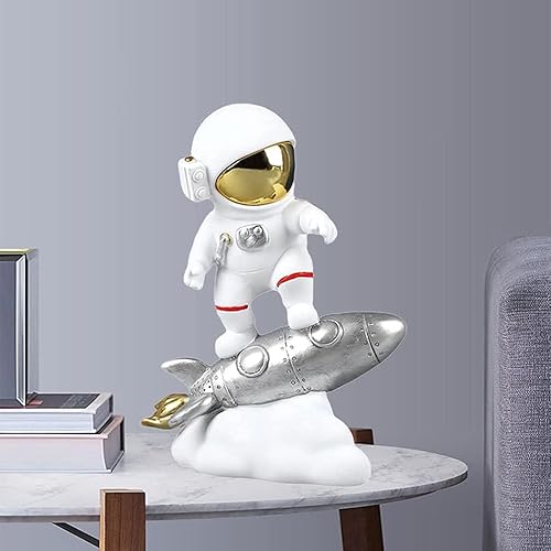 Miniatura 5 de Figura de astronauta de resina, escultura de astronauta, estatua del espacio exterior para decoración del hogar, adorno de oficina, cohete plateado