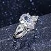 Hsitgexf Shining Classic Plated Silver Pear Cut Teardrop Halo Cubic Zirconia CZ Statement 3-Stone Eternity Wedding Engagement Ring for Women (US size 7)