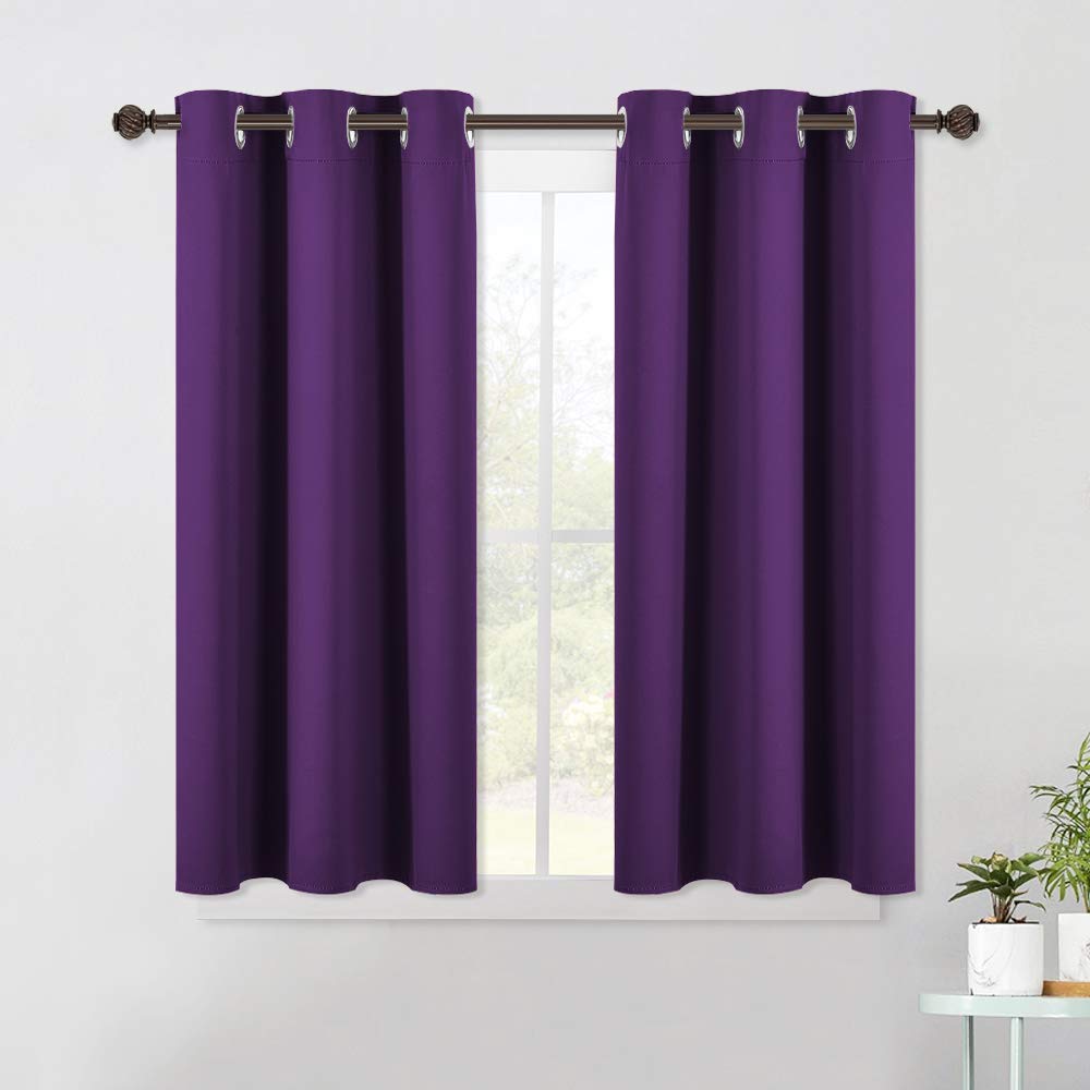 NICETOWN Thermal Insulated Blackout Draperies Curtains, Triple Weave Home Decoration Solid Ring Top Blackout Drape Panels for Bedroom (Set of 2, 42 x 45 Inch, Royal Purple)