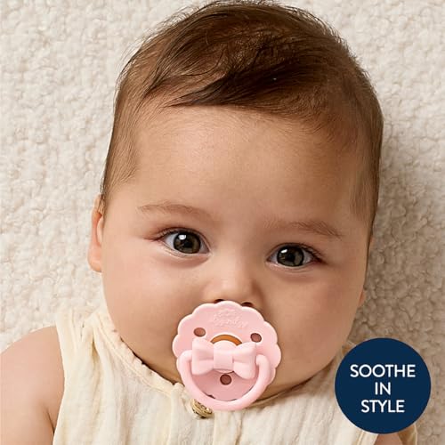 Image of Itzy Ritzy Natural Rubber Pacifiers - Baby Pacifiers with Cherry-Shaped Nipple & Large Air Holes for Added Safety - Set of 2 Binkies in Light & Dark Pink Bows (Ages 0 - 6 Months)