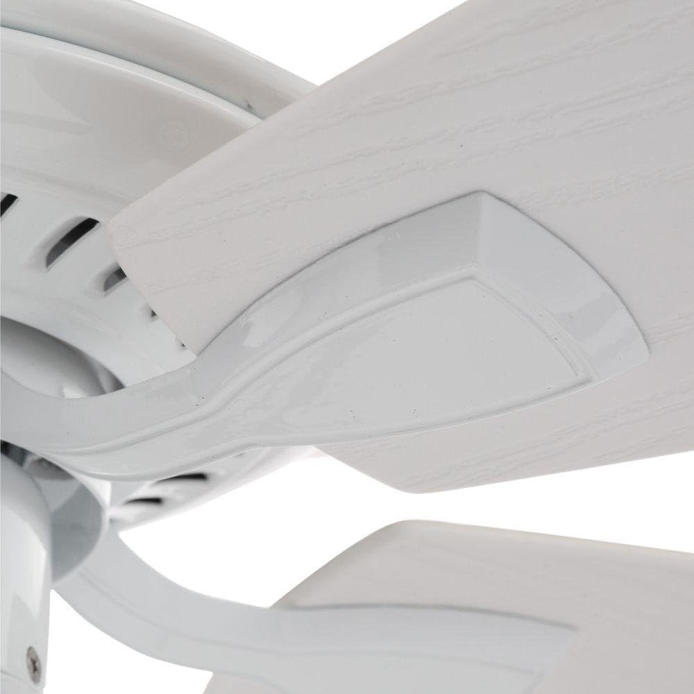 Close-up view of a Hampton Bay ceiling fan blade attached to its bracket