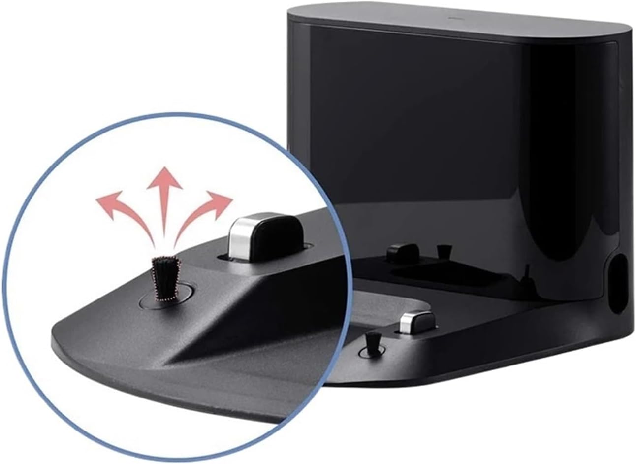 Close-up of charging contacts and brush on black docking station