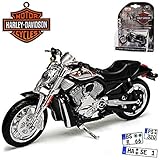 Aus Metall mit Plastikteilen, drehbaren und lenkbaren Rädern.