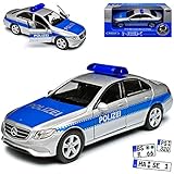 Aus Metall mit Plastikteilen, öffnenden Türen und drehbaren Rädern.