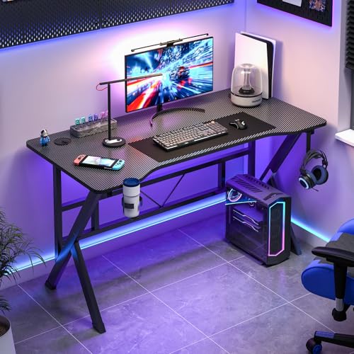 مكتب العاب على شكل حرف K بسطح من الياف الكربون مع فتحتين للك...