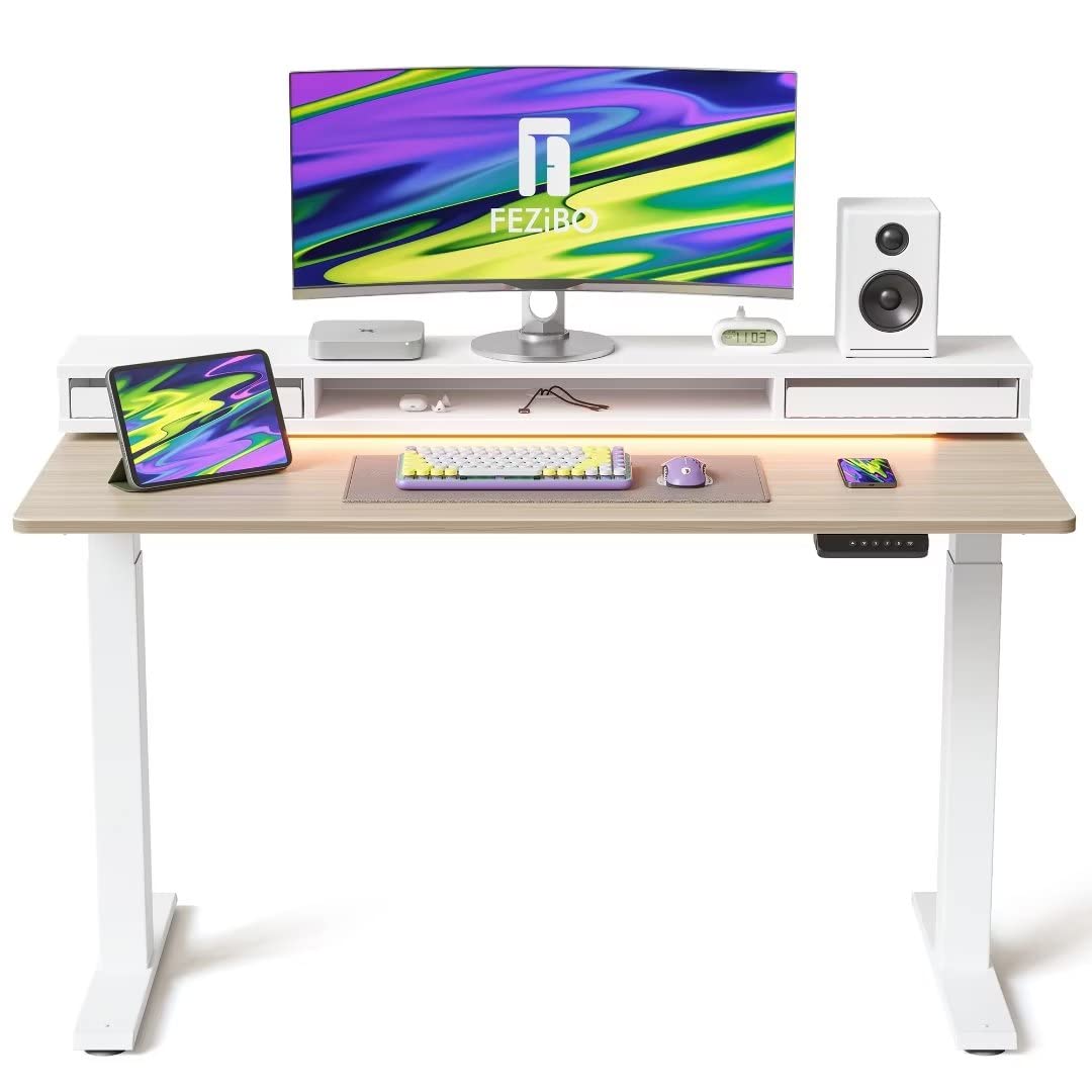 FEZIBO 140 * 60cm Electric Standing Desk with Monitor Stand, Height Adjustable Table with LED Strips, Ergonomic Home Office Furniture with 2 Drawers Storage Gaming Workstation, Light Walnut Top