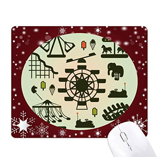 Tapis de souris design féerique vert sombre silhouette parc d'attractions neige
