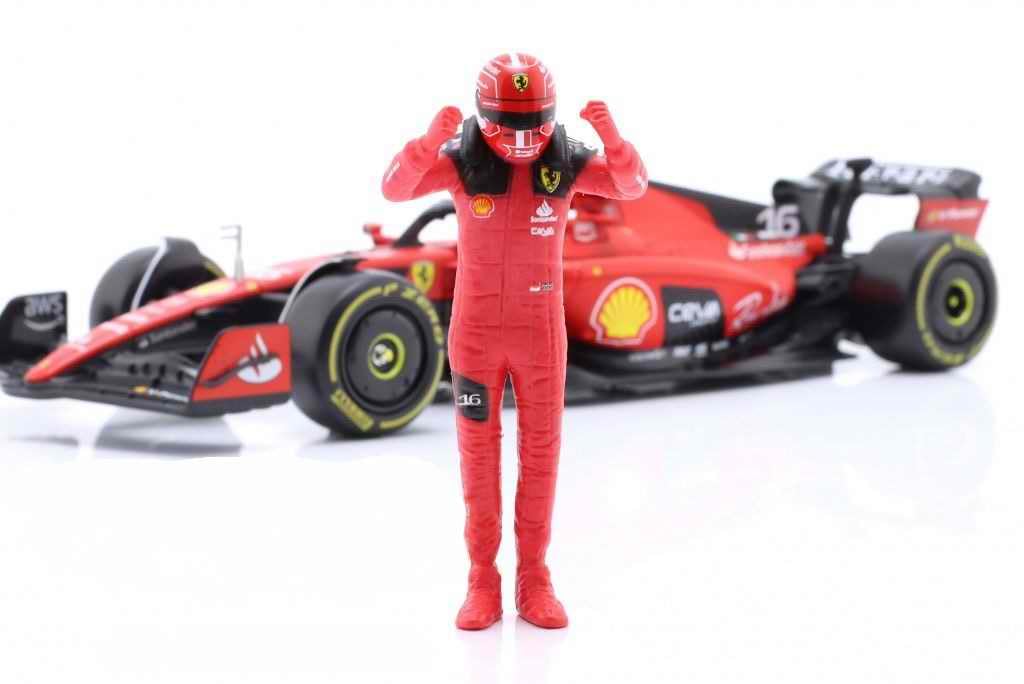 Burago - Auto da collezione Formula 1, compatibile con Ferrari SF23 con statuetta Charles Leclerc 2023 1/24 in metallo