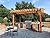 Pergola Depot Big Kahuna 12x16 Cedar Pergola Kit with 10' Posts and End Shape B