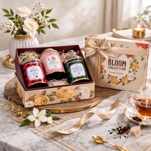 Image of Sancha Tea Boutique, Bloom Collection Tea Gift Box | English Breakfast, Darjeeling & Masala Chai | 3 x 25 Pyramid Tea Bags | Premium Floral Gift Box with Golden Ribbon & Carry Bag