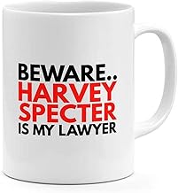 مج قهوة بتصميم مطبع بعبارة «Beware Harvey Specter Is My Lawyer» من رين لون ابيض، 11 اونصة، سيراميك