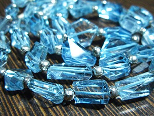 114 Carat-AAA Blue Topaz Step Cut Nuggets- 17"Strand -Stones Measure- 7-10mm Long.