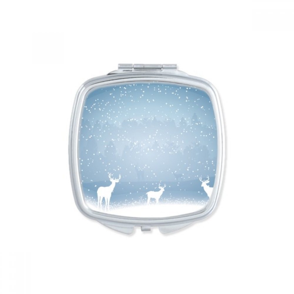 Miroir de poche cerf sous la neige pour des retouches beauté nomades et élégantes en voyage