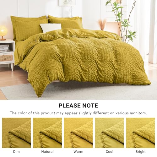 Image of HYMOKEGE Mustard Yellow California King Comforter Set Seersucker 7 Pieces, All Season Luxury Bed in a Bag for Bedroom, Bedding Set with Comforter, Sheets, Pillowcases & Shams