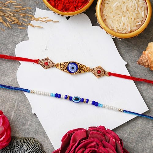 Image of eCraftIndia Set of 2 Evil Eye Designer Rakhis for Brother with Roli Chawal Pack | Raksha Bandhan Rakhi