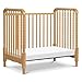 DaVinci Jenny Lind 3-in-1 Convertible Mini Crib in Honey, Removable Wheels, Greenguard Gold Certified