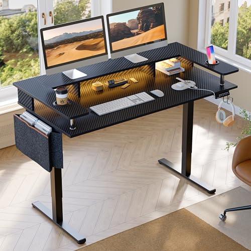 Bestier LED Gaming Electric Standing Desk Adjustable Height, 58x26 Inch Large Sit Stand Desk with Monitor Stand, Ergonomic Rising Office Desk with Headphone Hook & Storage Bag, 3D Carbon Fiber