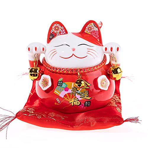 Questo giapponese Maneki NEKO viene fornito con il suo cuscino e campana