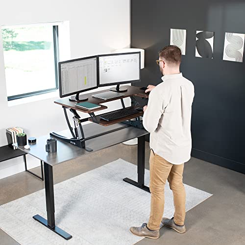 Image of VIVO Dark Walnut 42 inch Standing Desk Converter, DESK-V000VLD | Height Adjustable, Stand Up Desk Riser, Wide Keyboard Tray, Dual Monitor and Laptop Workstation, Black Frame, V Series