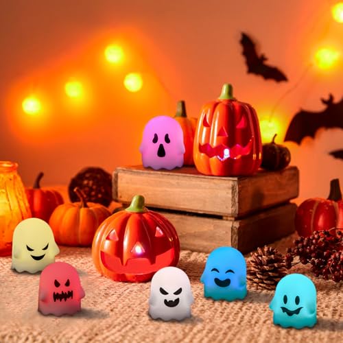 Image of Eldnacele Ghost Flickering Flameless Candles with Remote and Timer, Battery Operated Color Changing Lights Spooky Ambiance LED Tea Lights for Halloween Fireplace Indoor Decoration (6Pcs, 2 inch x 2.4 inch)