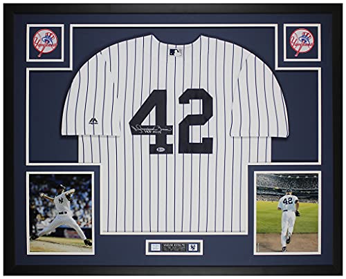 Mariano Rivera Autographed P S Yankees Jersey - Beautifully Matted and Framed - Hand Signed By Rivera and Certified Authentic by Beckett - Includes Certificate of Authenticity