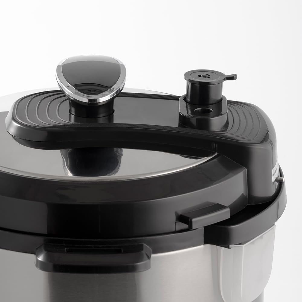 Close-up of pressure cooker lid with pressure release valve