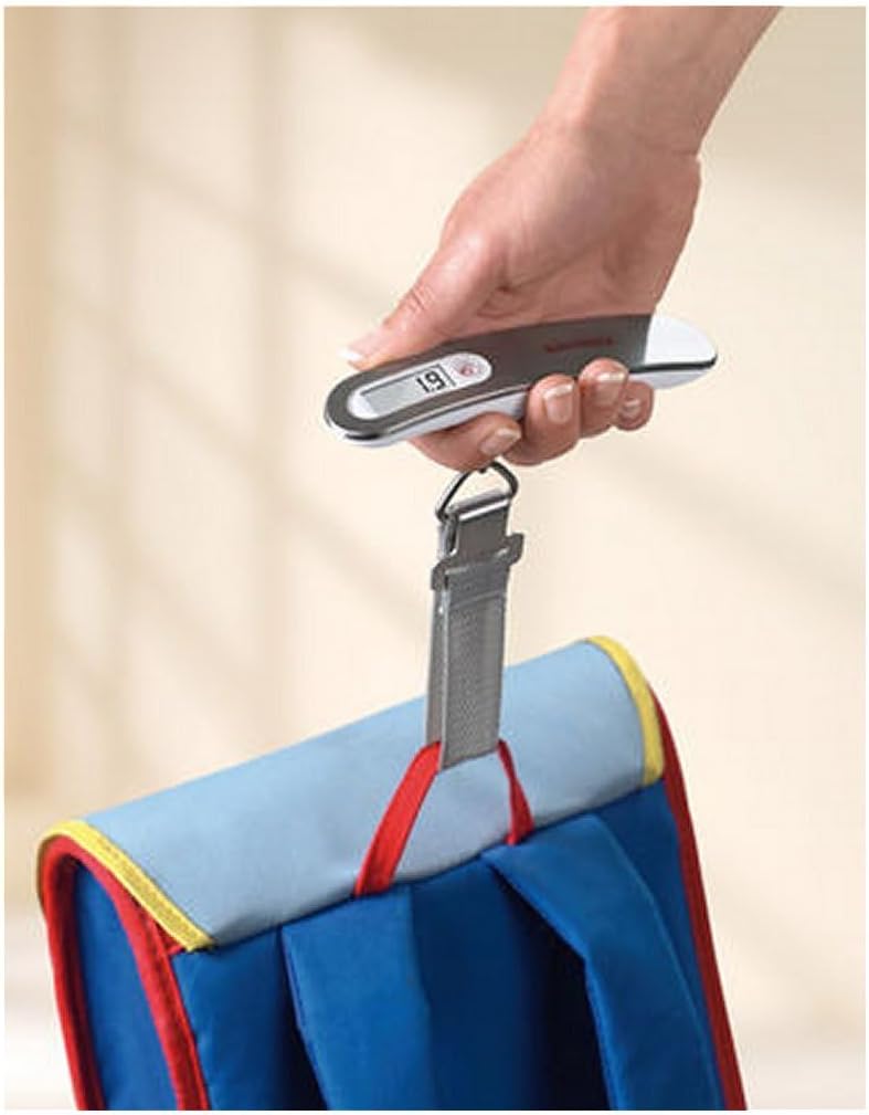 Person using the Soehnle Luggage Travel Scale to weigh a backpack